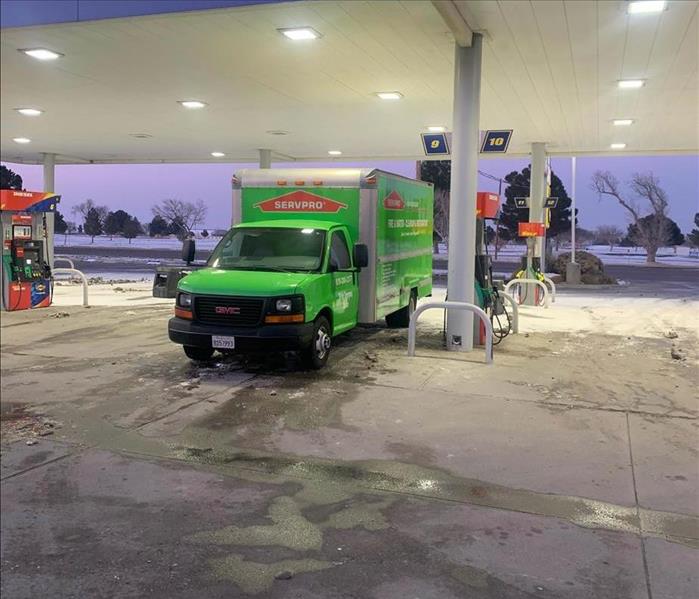 SERVPRO van at a gas station.