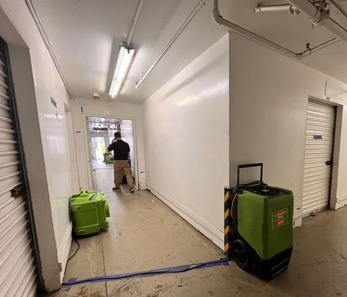 Dehumidifiers in a storage space.