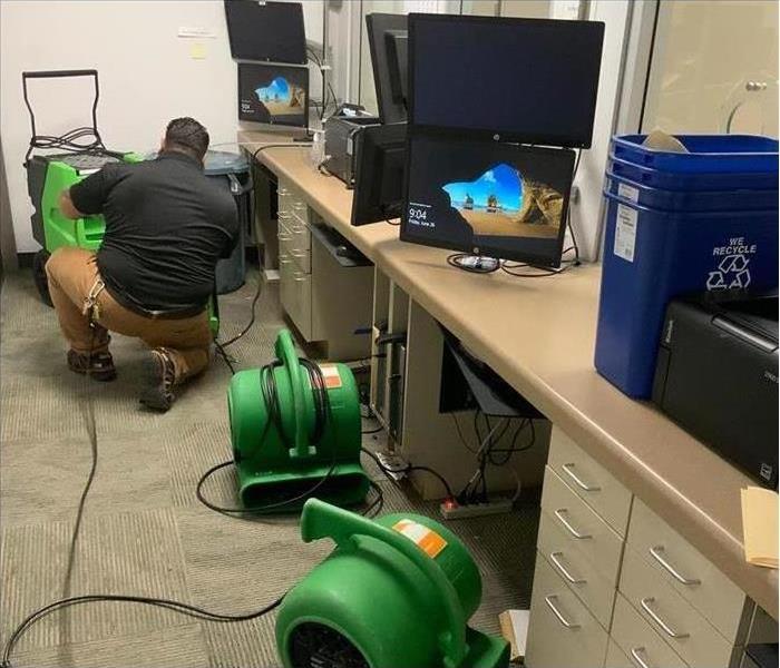 Installing air movers in an office